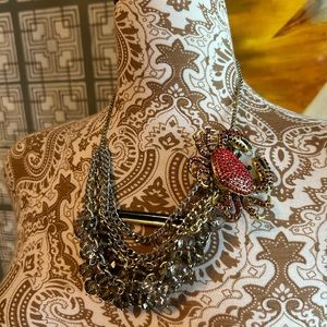 Multi-strand reclaimed necklace with Heidi Daus brooch